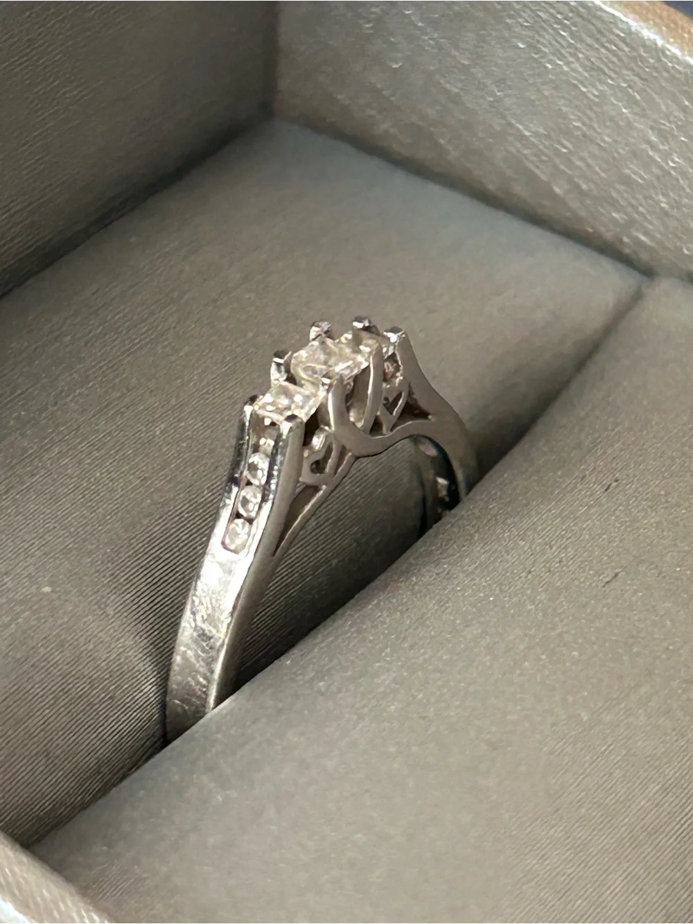 10K White Gold Ring 1/4 Ct princess cut 3 main stones, purchased from Zales 6